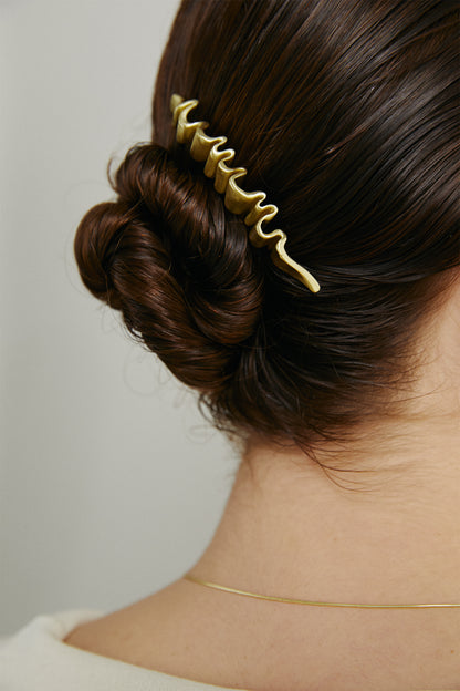 THE MULTI-TOOTH HAIRPIN