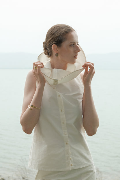 Ully Cream Diagonal Button Sleeveless top
