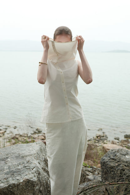 Ully Cream Diagonal Button Sleeveless top